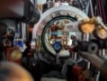 Photo of the vacuum chamber containing the rubidium MOT, surrounded by optics and imaging systems