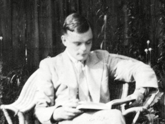 zPhotograph of a young Alan Turing courtesy Rex Features