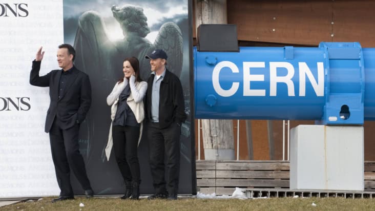 Left to right: Tom Hanks and Ayelet Zurer with director Ron Howard. Standing in front on CERN particle physics laboratory in 2009