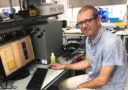 Photo of Bruce Drinkwater in his ultrasound lab at the University of Bristol