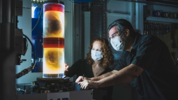 Dr Claire Walsh, Dr Paul Tafforeau at ESRF on beamline BM05 with two samples prepared for HiP-CT imaging