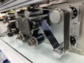 Photo of the roll-to-roll printing system used to produce the hybrid perovskite solar cells