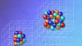 Image showing three clusters of spheres, representing nucleons, within a 3D grid