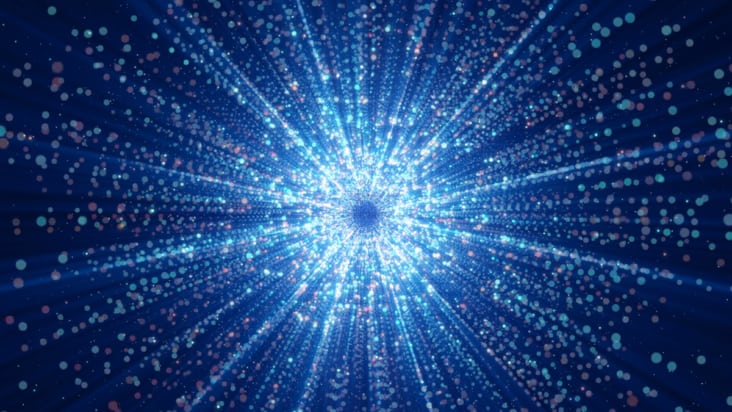 Image of particles shooting outward from a common origin