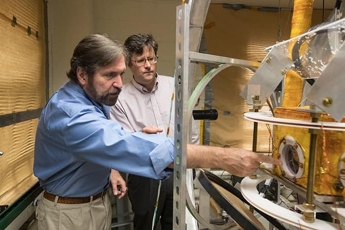 Photograph of Gordon Cates and Wilson Miller in their lab